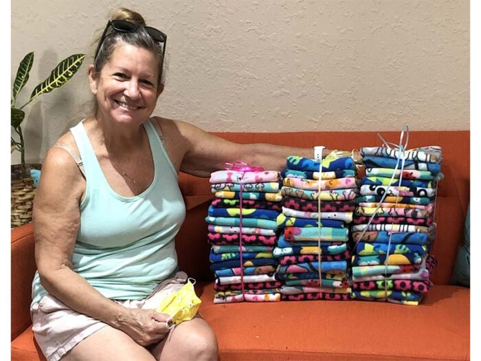 Sharon donating small blankets for pets